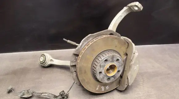 Front wheel hub spindle knuckle