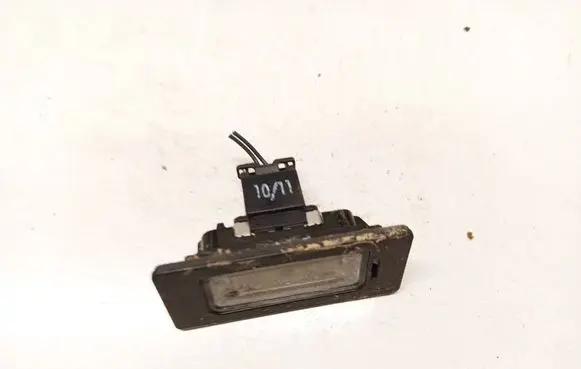 Volkswagen PASSAT B6 Number plate light 7PP943021