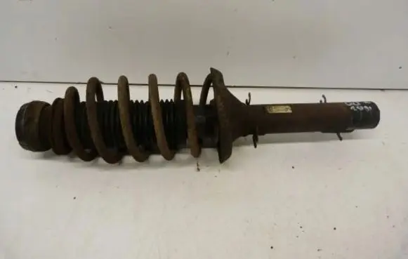 Volkswagen Golf IV Front shock absorber with coil spring 1J0413031AE