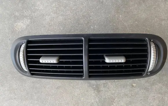 Porsche Cayenne (9PA) Dash center air vent grill 7L5819727B