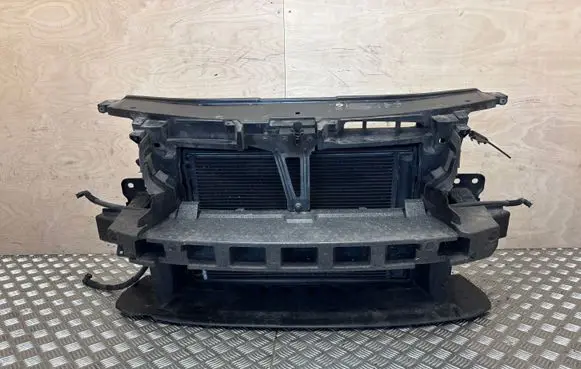 Radiator support slam panel