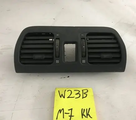 Mazda 323 Dash center air vent grill 65895256