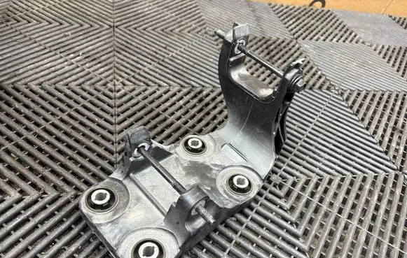 Ford Mustang Mach-E A/C compressor mount bracket A64RA HJ9H19F669AE 19H19E669AB