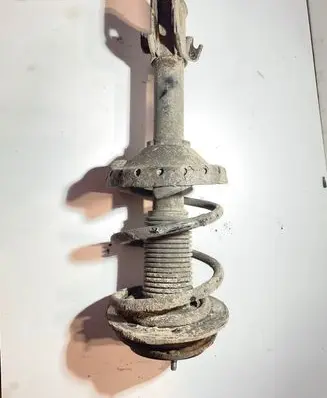 Subaru Legacy Front shock absorber with coil spring