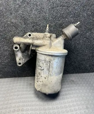 Mercedes-Benz S W126 Oil filter mounting bracket 1101801011 0011846525