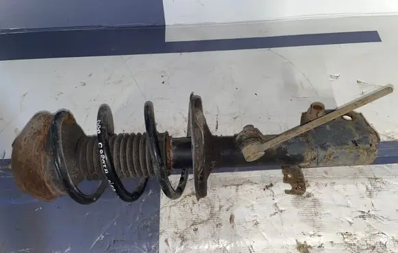 Front shock absorber with coil spring