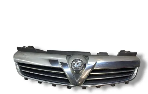 Opel Zafira B Front bumper upper radiator grill 13247331