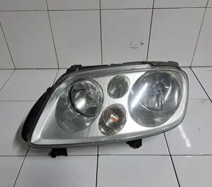 Volkswagen Touran I Headlight/headlamp 0301205201