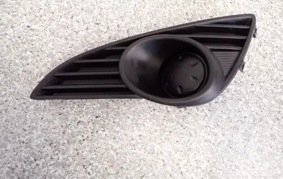 Suzuki Splash Front fog light trim/grill