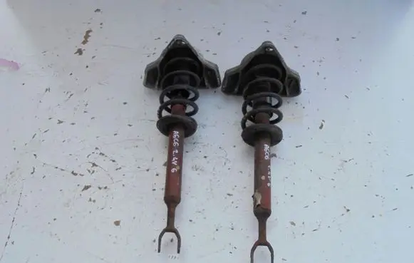 Audi A6 S6 C6 4F Front shock absorber with coil spring MCPERSON
