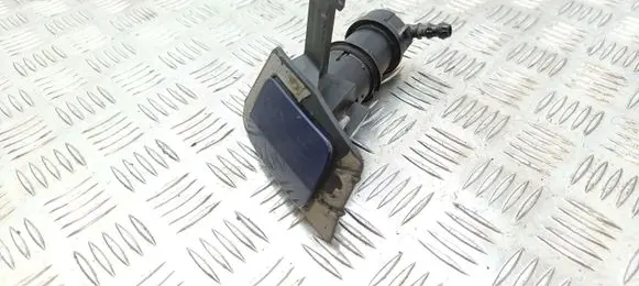 Headlight washer spray nozzle