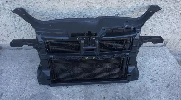 Top upper radiator support slam panel