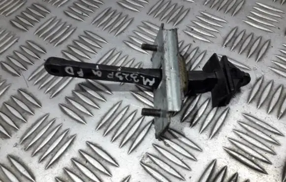 Mazda 323 F Front door check strap stopper 
