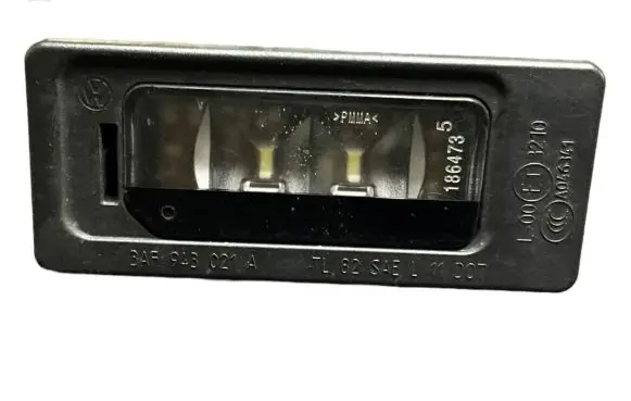 Volkswagen Golf VI Number plate light 185001 011202 3AF943021A