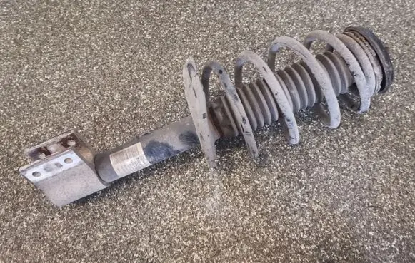 Front shock absorber with coil spring