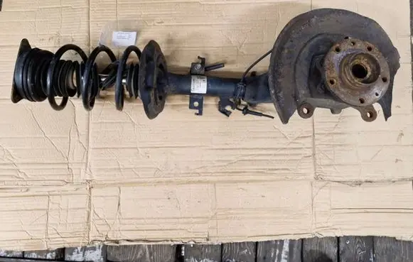 Nissan Qashqai Front shock absorber with coil spring
