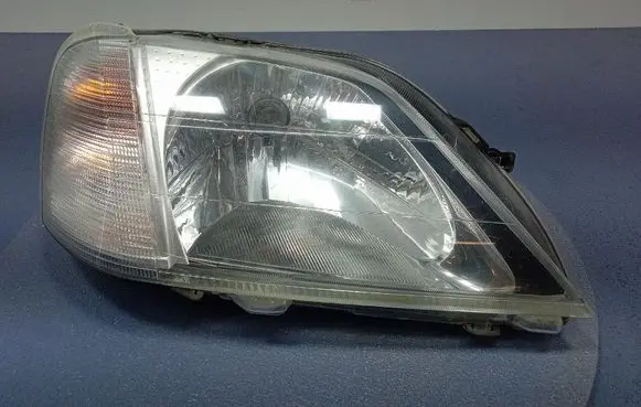 Dacia Logan I Headlight/headlamp 8200211006