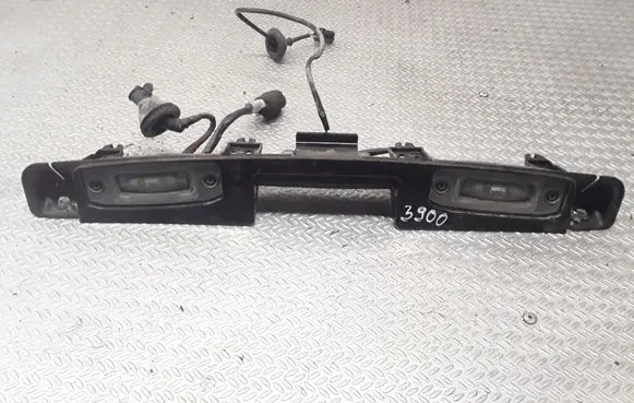 KIA Carens II Number plate light