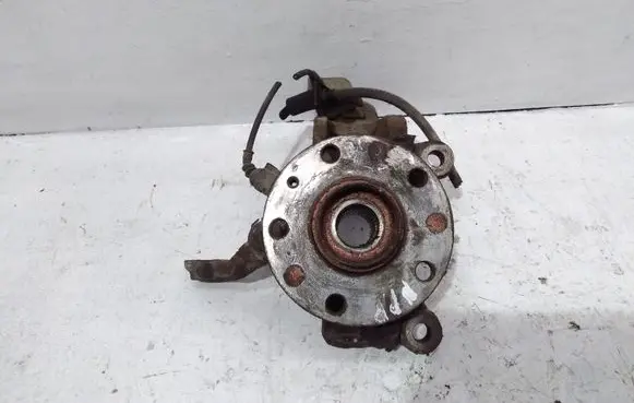 Volkswagen Touran I Front wheel hub spindle knuckle 1K06N