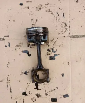 Piston with connecting rod