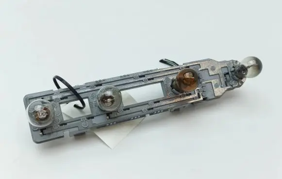 Mercedes-Benz C W203 Tail light bulb cover holder