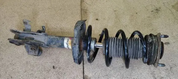 Front shock absorber with coil spring