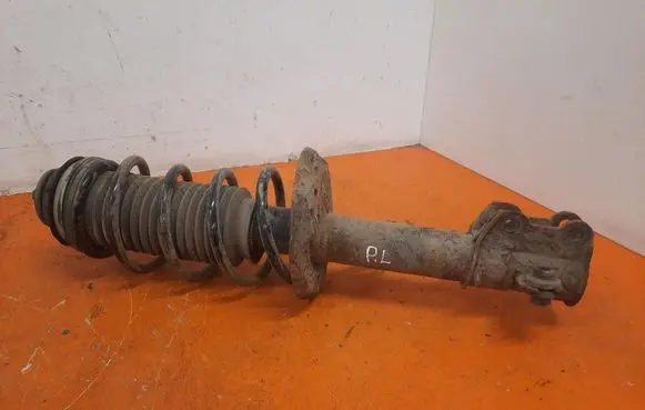 Opel Corsa D Front shock absorber with coil spring