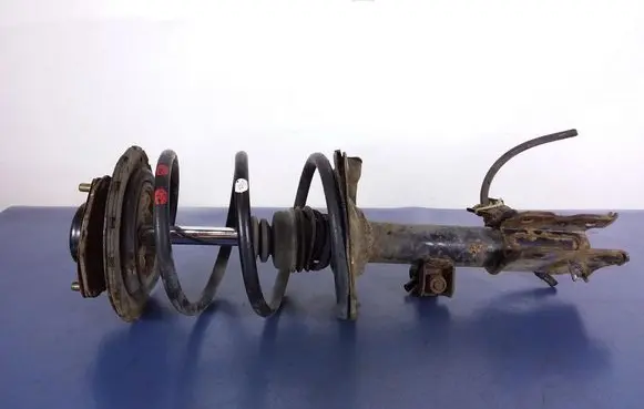 Nissan Murano Z50 Front shock absorber with coil spring