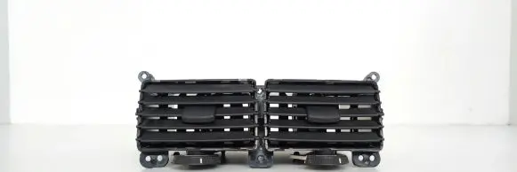 KIA Sportage Dash center air vent grill KM84810A