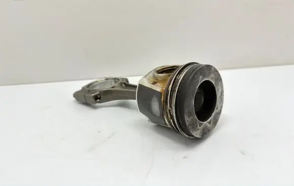 Piston with connecting rod