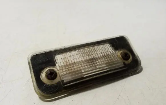 Volkswagen PASSAT B4 Number plate light E10022915