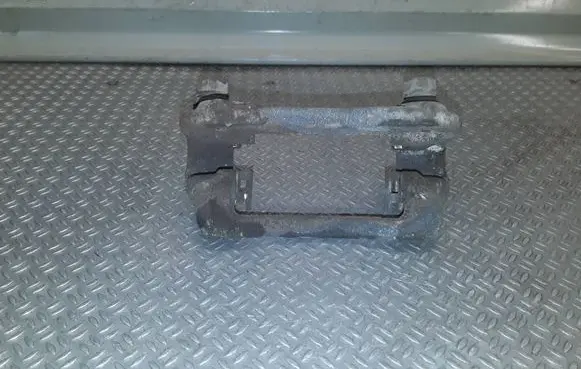 SsangYong Korando Brake caliper pad carrier rear 