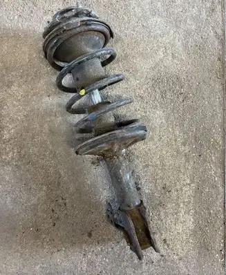 Toyota Avensis T220 Front shock absorber with coil spring