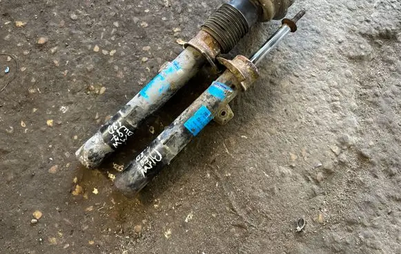 BMW 1 E81 E87 Front shock absorber with coil spring 32K79A