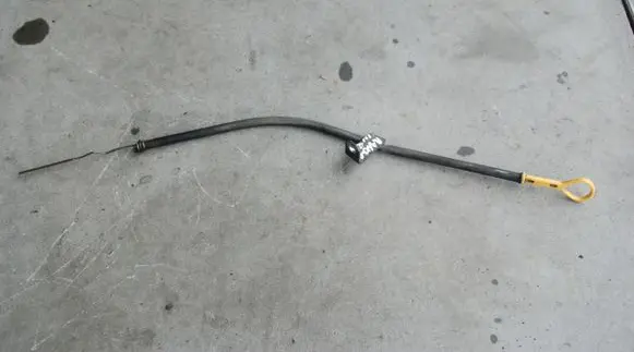 Oil level dip stick