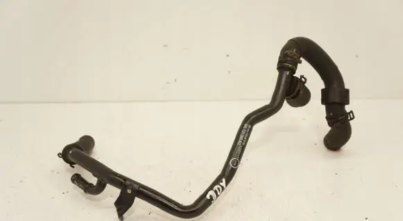 Volkswagen Golf VII Engine coolant pipe/hose 04L121064AQ