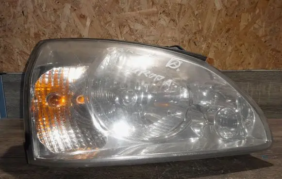 KIA Carens I Headlight/headlamp 0857