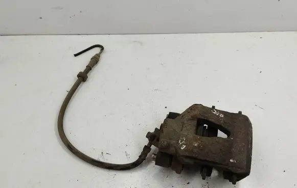 Volkswagen Golf IV Front brake caliper