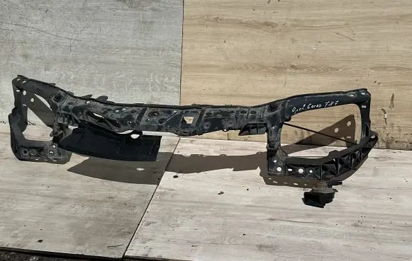 Top upper radiator support slam panel