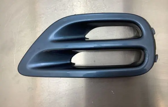 Subaru Legacy Front bumper lower grill 57731AG020