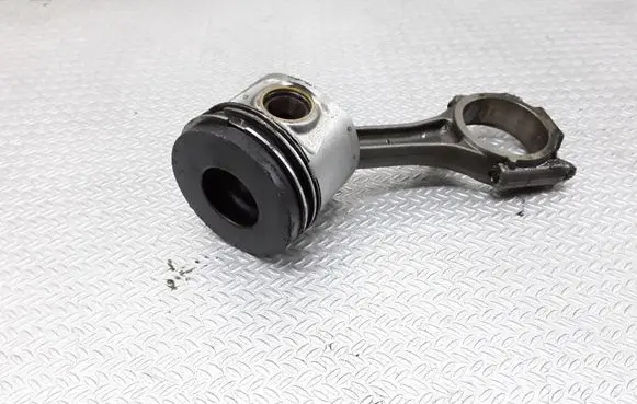 Piston with connecting rod