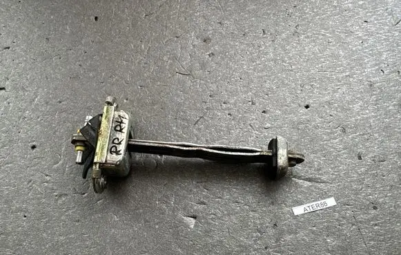 Nissan Terrano Rear door check strap stopper 824300F600