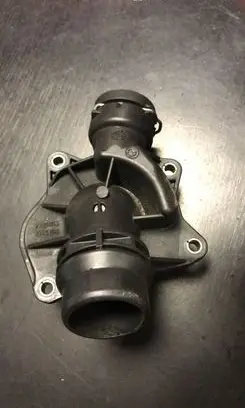 Thermostat/thermostat housing