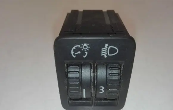 Headlight level height control switch