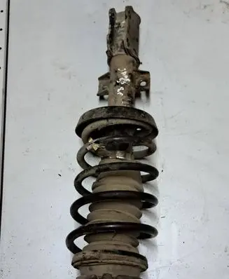 Front shock absorber with coil spring