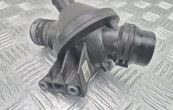Thermostat/thermostat housing