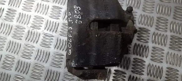 Volkswagen Golf V Front brake caliper