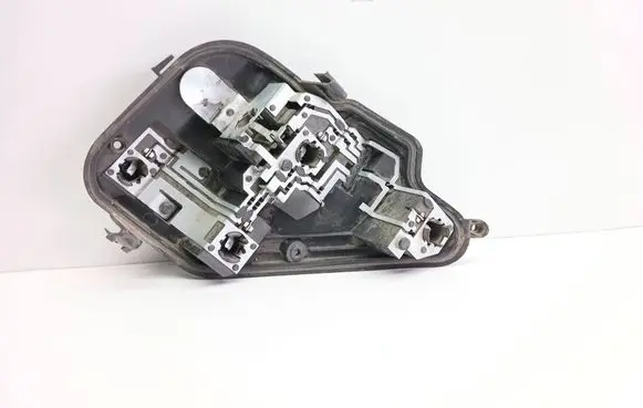 Tail light bulb cover holder
