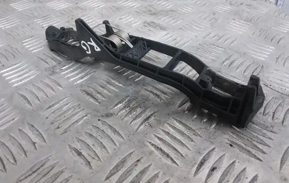 Rear door exterior handle/bracket