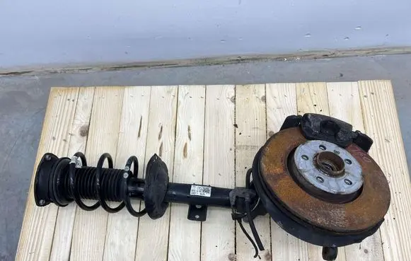 Volkswagen Taigo Front shock absorber with coil spring 2q0413031em